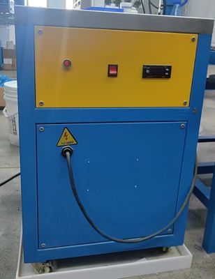 Machine à étiquettes en silicone innovante avec congélateur de moule pour une production d'étiquettes de vêtements rapide et constante